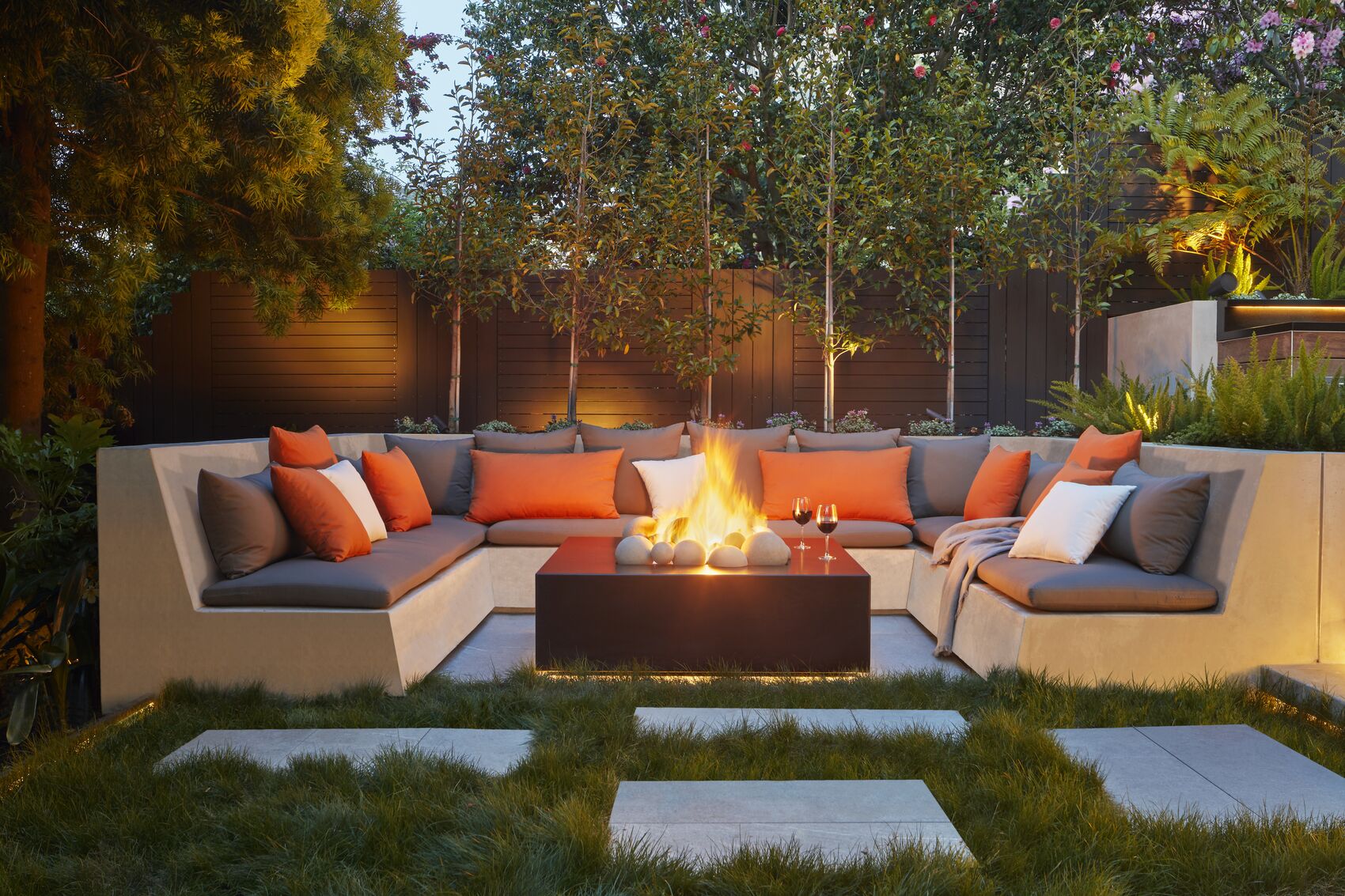 Garden gathering space with fire pit — Troon Pacific residence